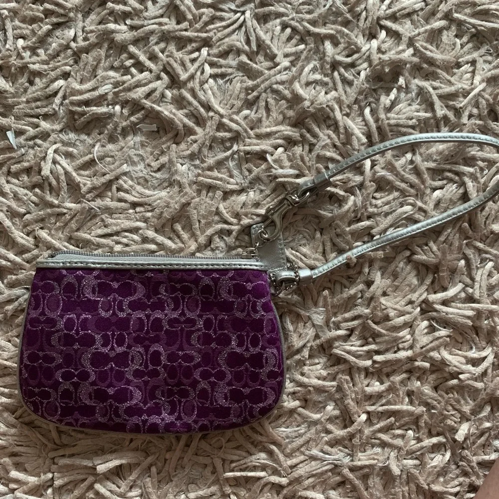 Coach Signature Wristlet in Metallic Purple